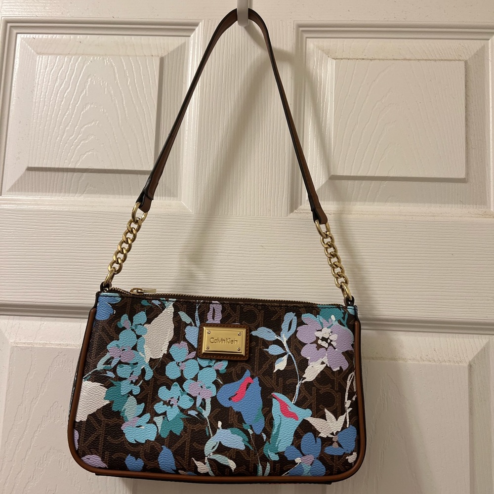Calvin Klein canvas floral shoulder bag.